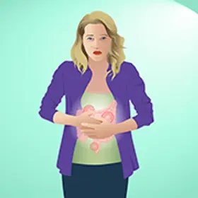 Eine Frau, die sich am Bauch hält